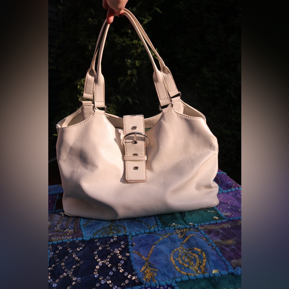 white buckle hobo bag